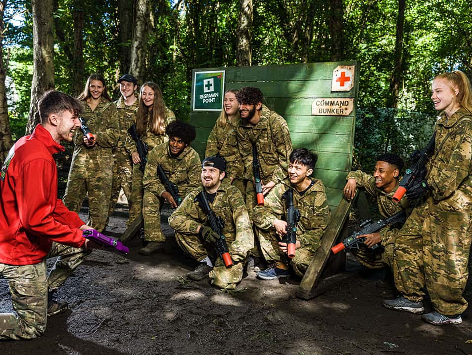 Laser Tag team briefing in base camp